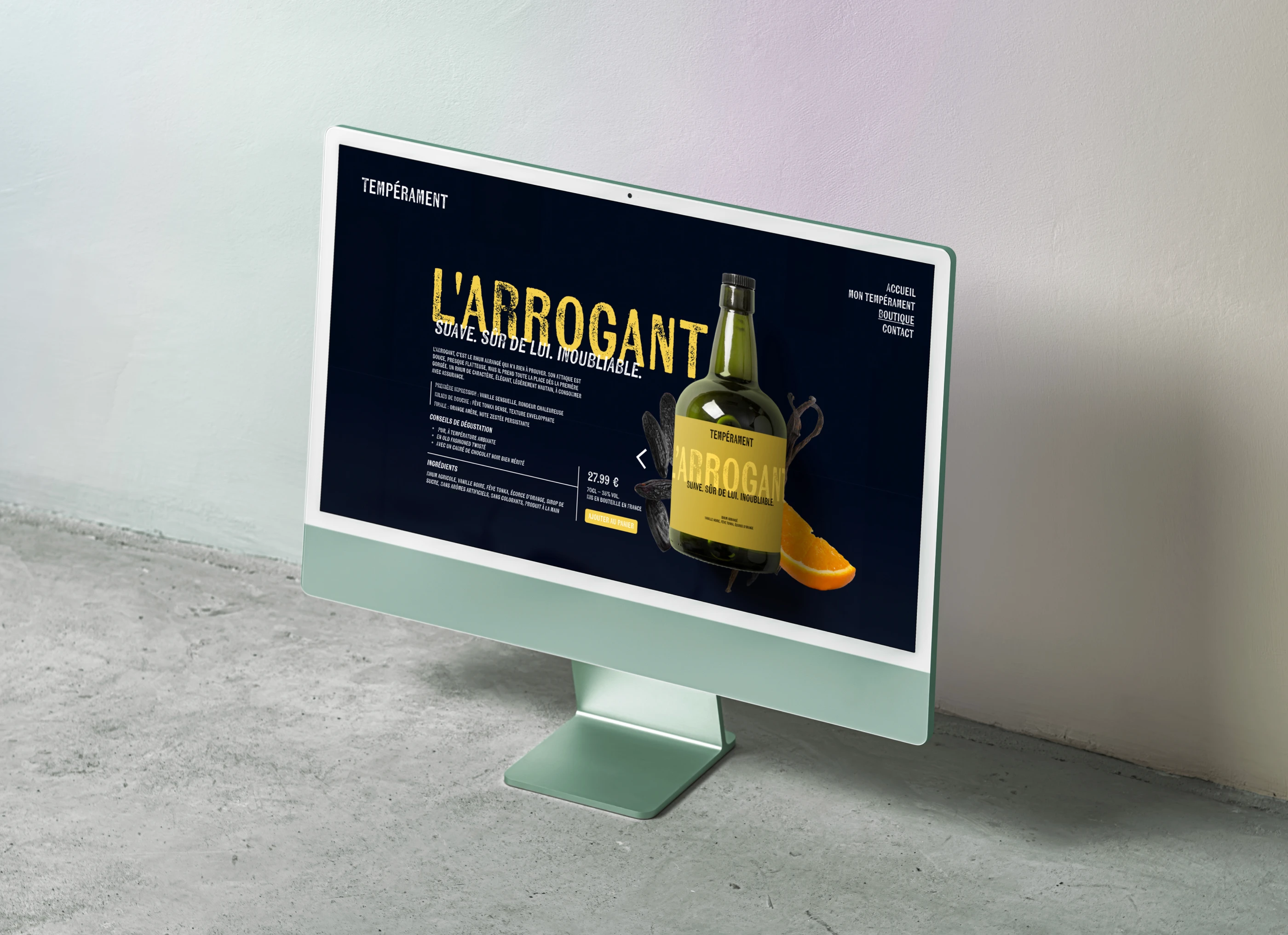Mise en situation du site e-commerce Tempérament sur un écran d'iMac dans un décor épuré en béton. Création de site web par Tartelette Concept.