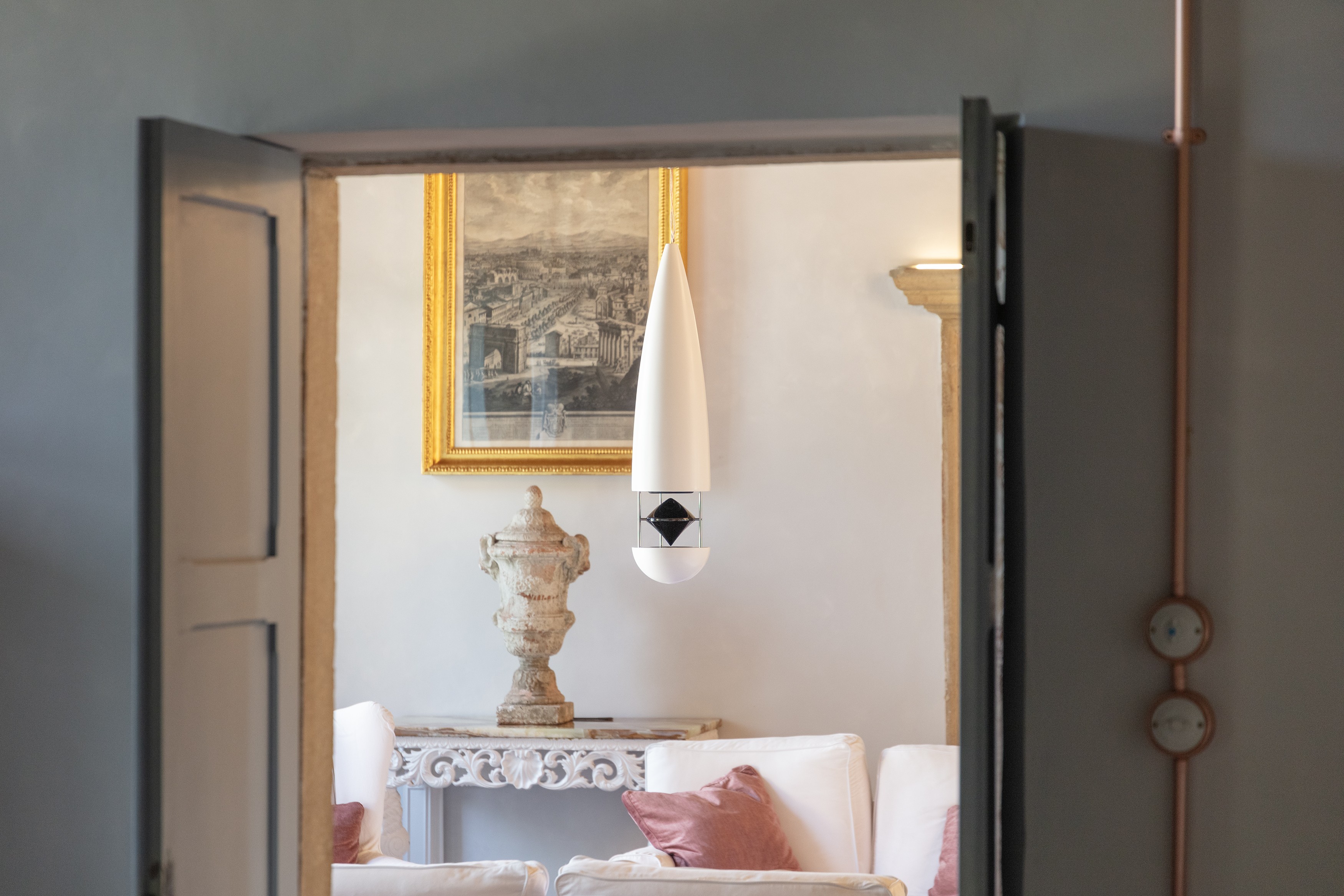 Streetside billboard with flyposters of the Batch.Works brand and illustrations