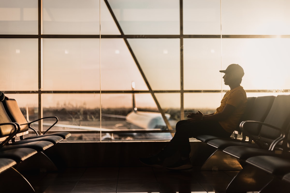 Traveler waiting near a terminal window