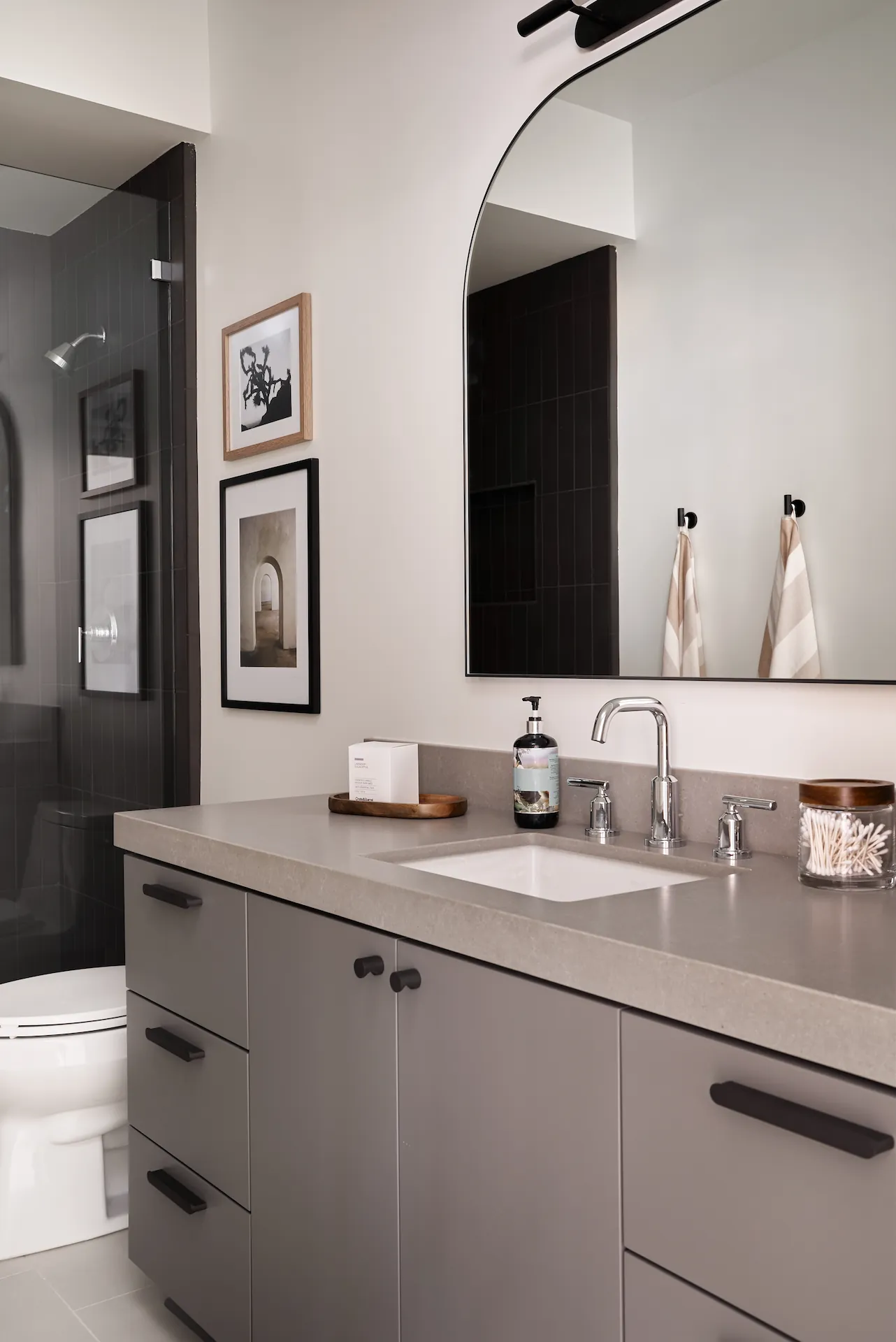 Second angle view of the guest bathroom, showcasing the vanity area. Photo by Todd Huge.
