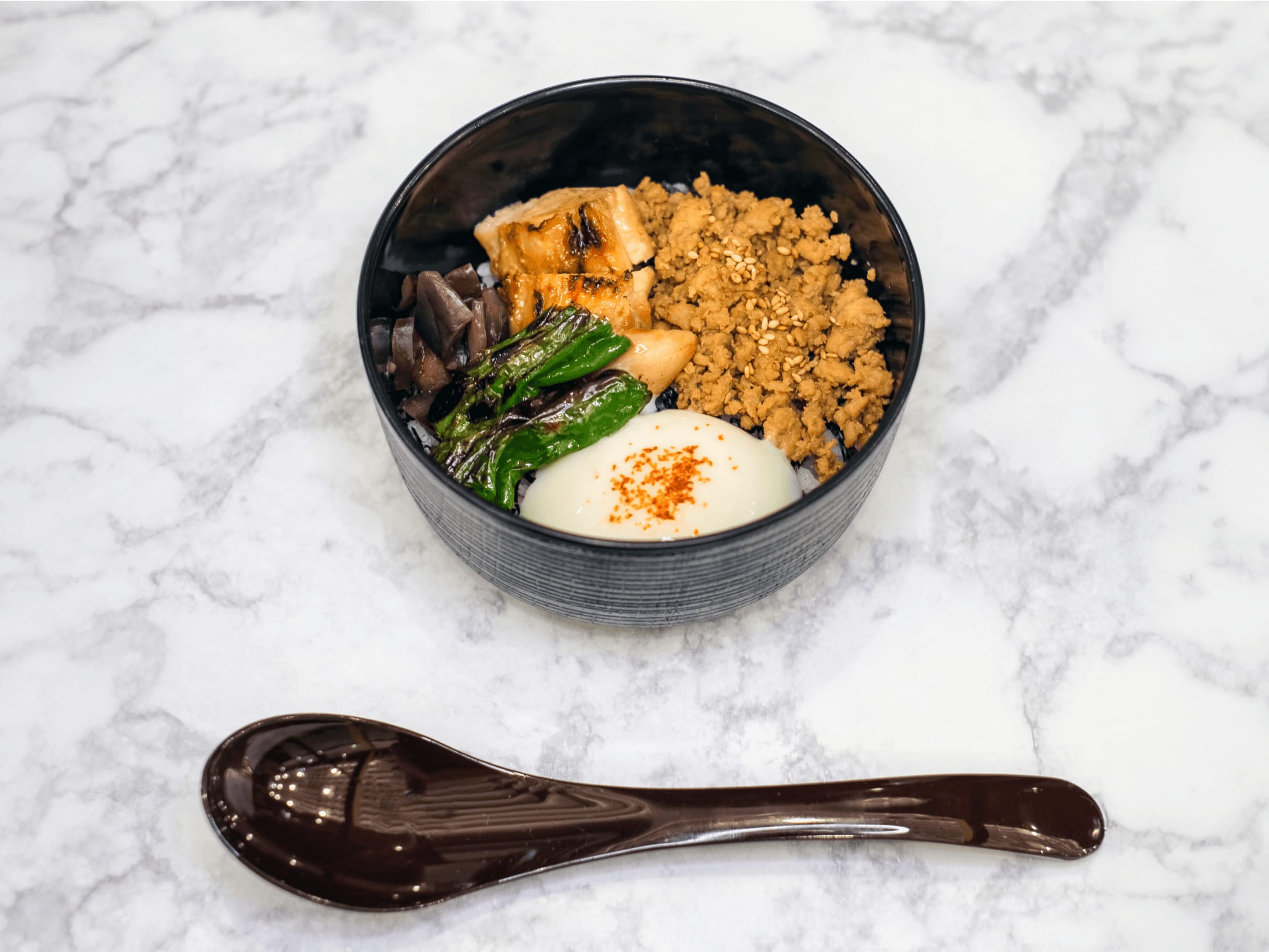 A bowl and spoon from an elegant kaiseki meal