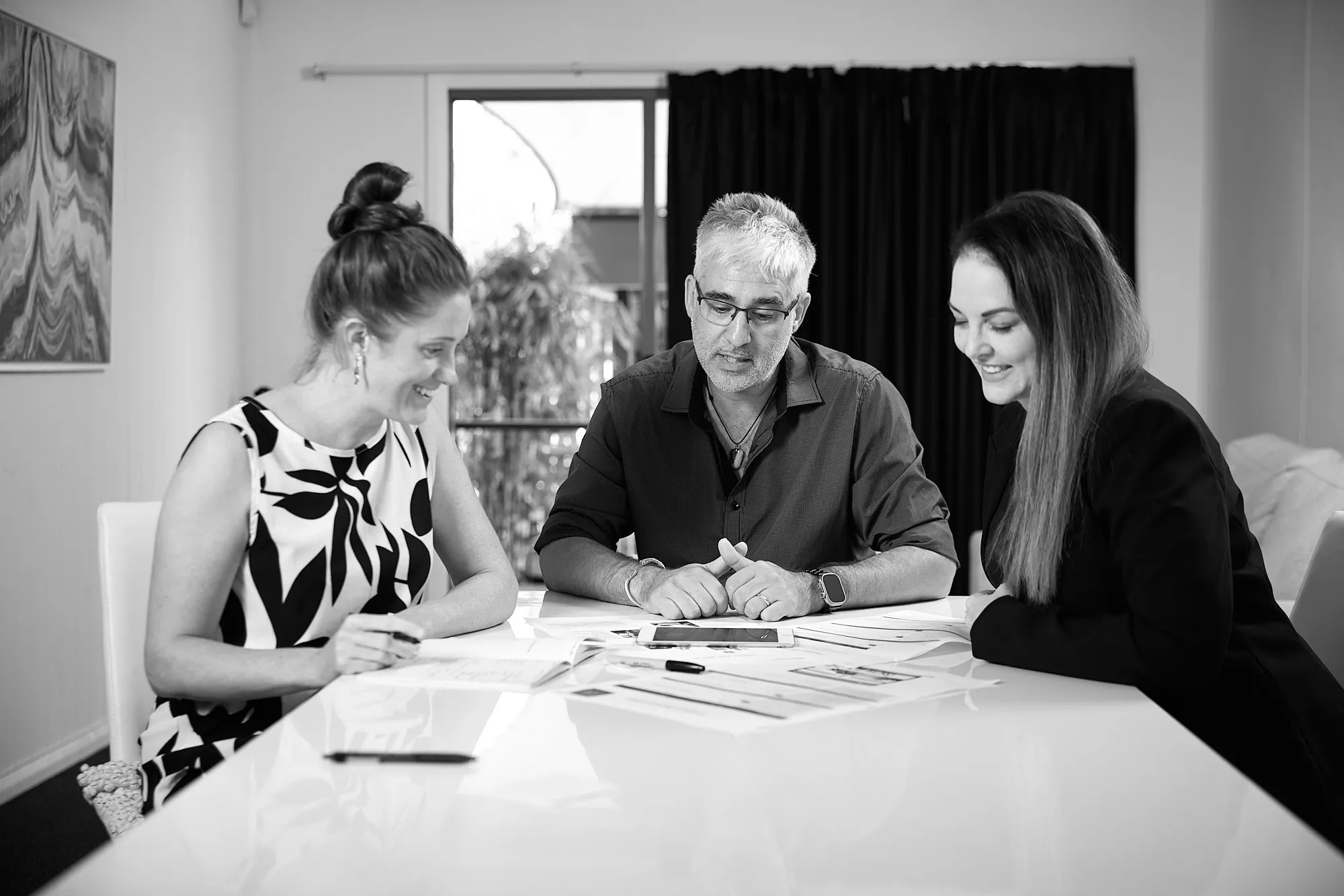 Team collaboration scene for a corporate or consulting website representing a Cairns company.