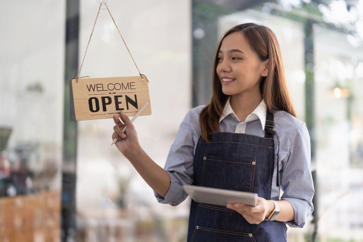 A female staff opening the store
