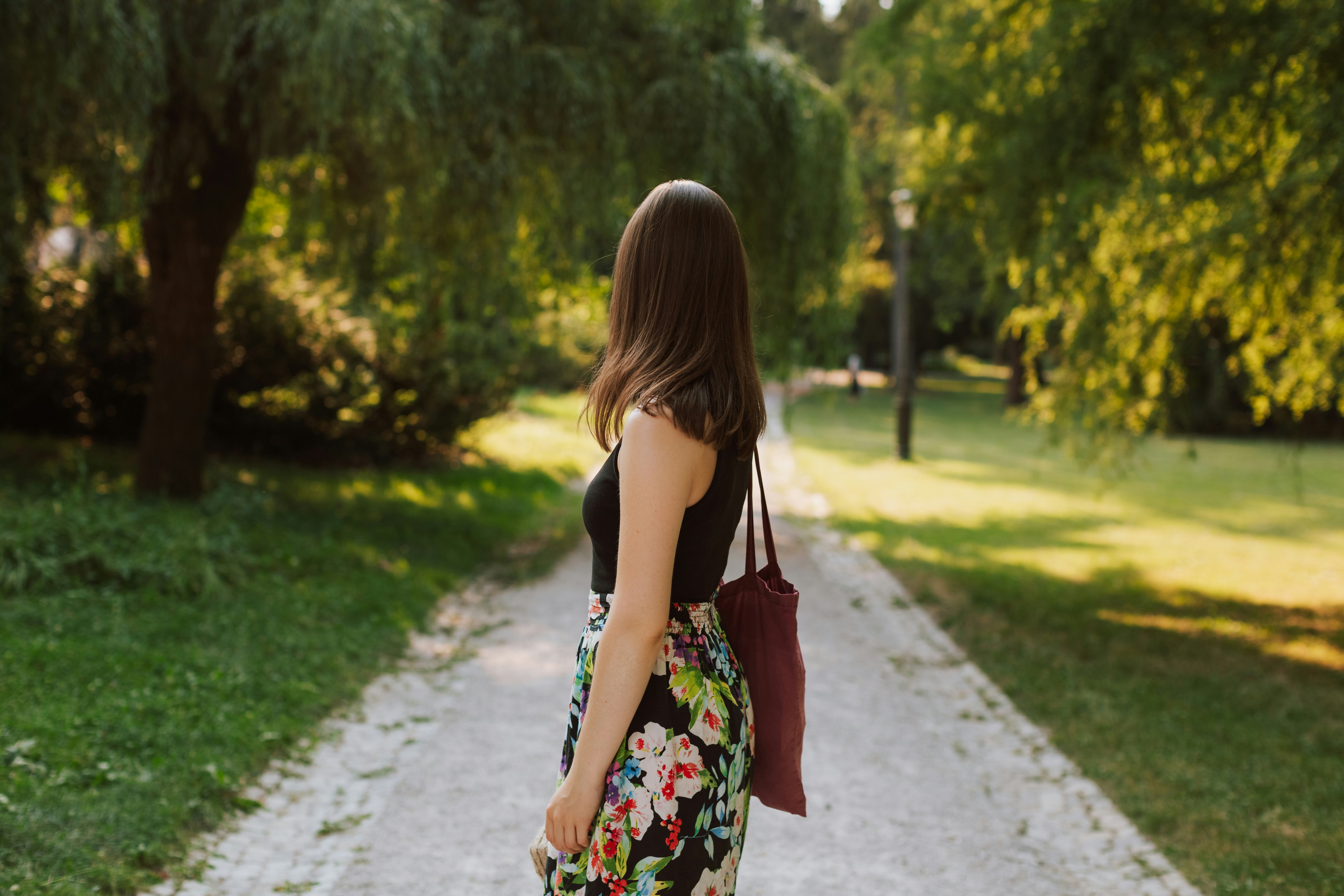 woman walking in a park - Light Spring Color Analysis