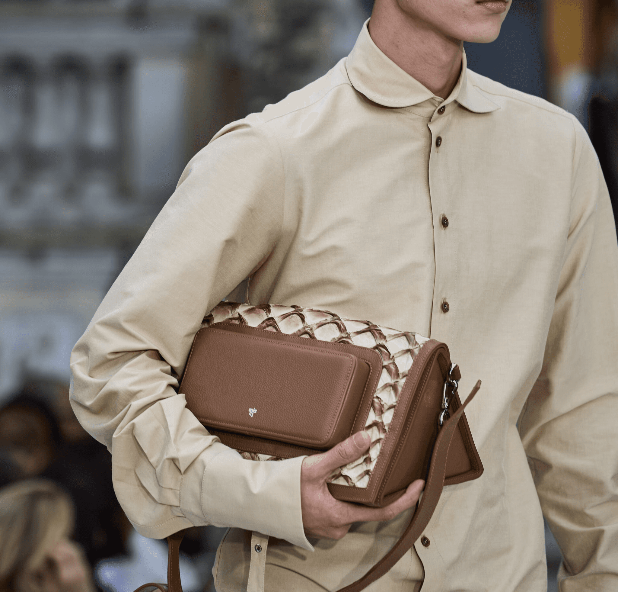 person writing on a piece of paper 
