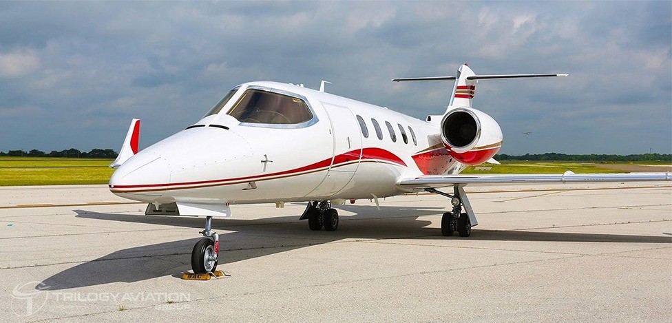 The Learjet 31A is a twin-engine, high-speed business jet produced by Bombardier Aerospace.      It is an upgraded version of the Learjet 31, featuring a longer range and faster cruise speeds.      The Learjet 31A can fly up to 1,450 nautical miles nonstop and has a maximum cruise speed of Mach 0.81. It typically seats up to eight passengers and has a maximum takeoff weight of 20,500 pounds.      The Learjet 31A has a spacious cabin with a height of 4.4 feet and a width of 4.9 feet. It is equipped with a full-service galley and an enclosed lavatory.