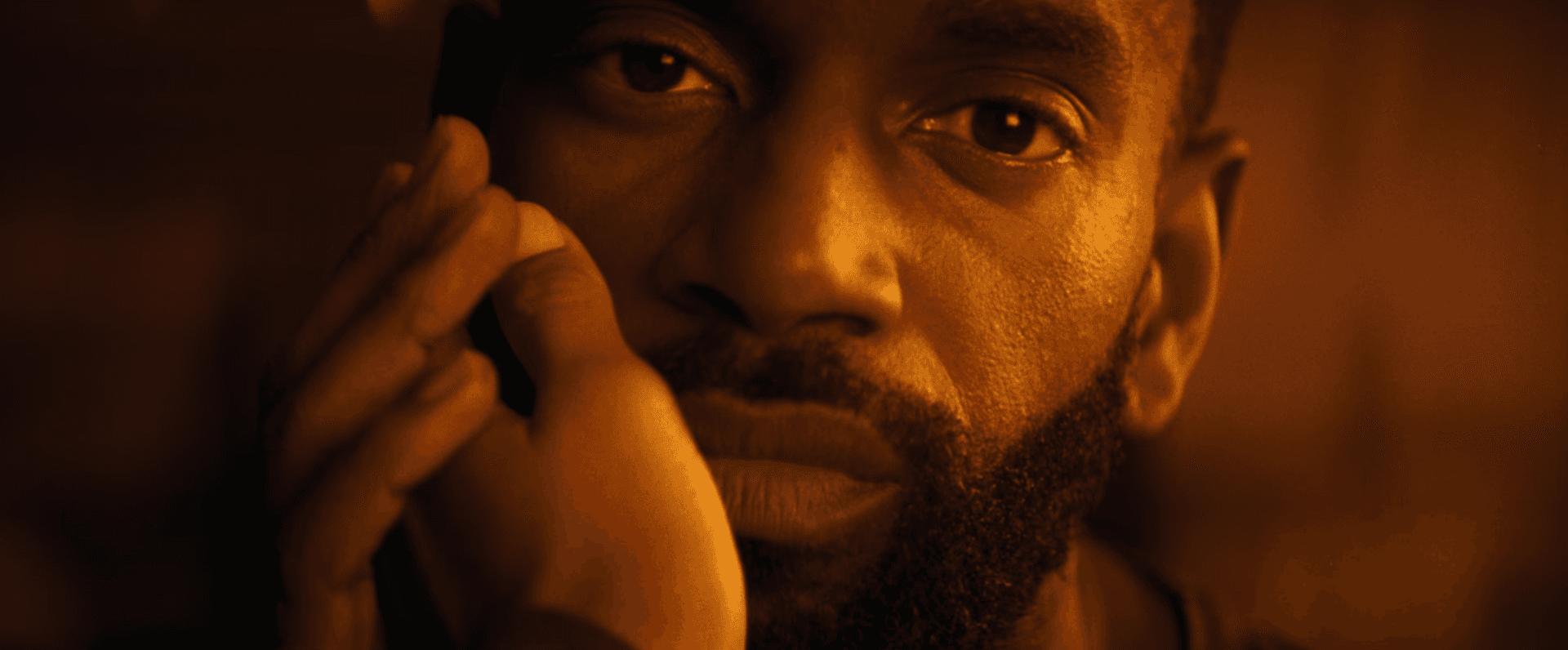 Two figures holding red and blue circles over their faces on yellow background.