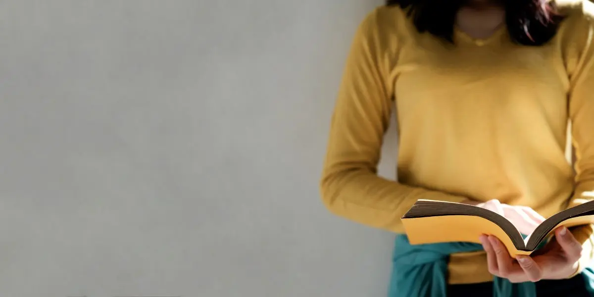 Woman holding a book