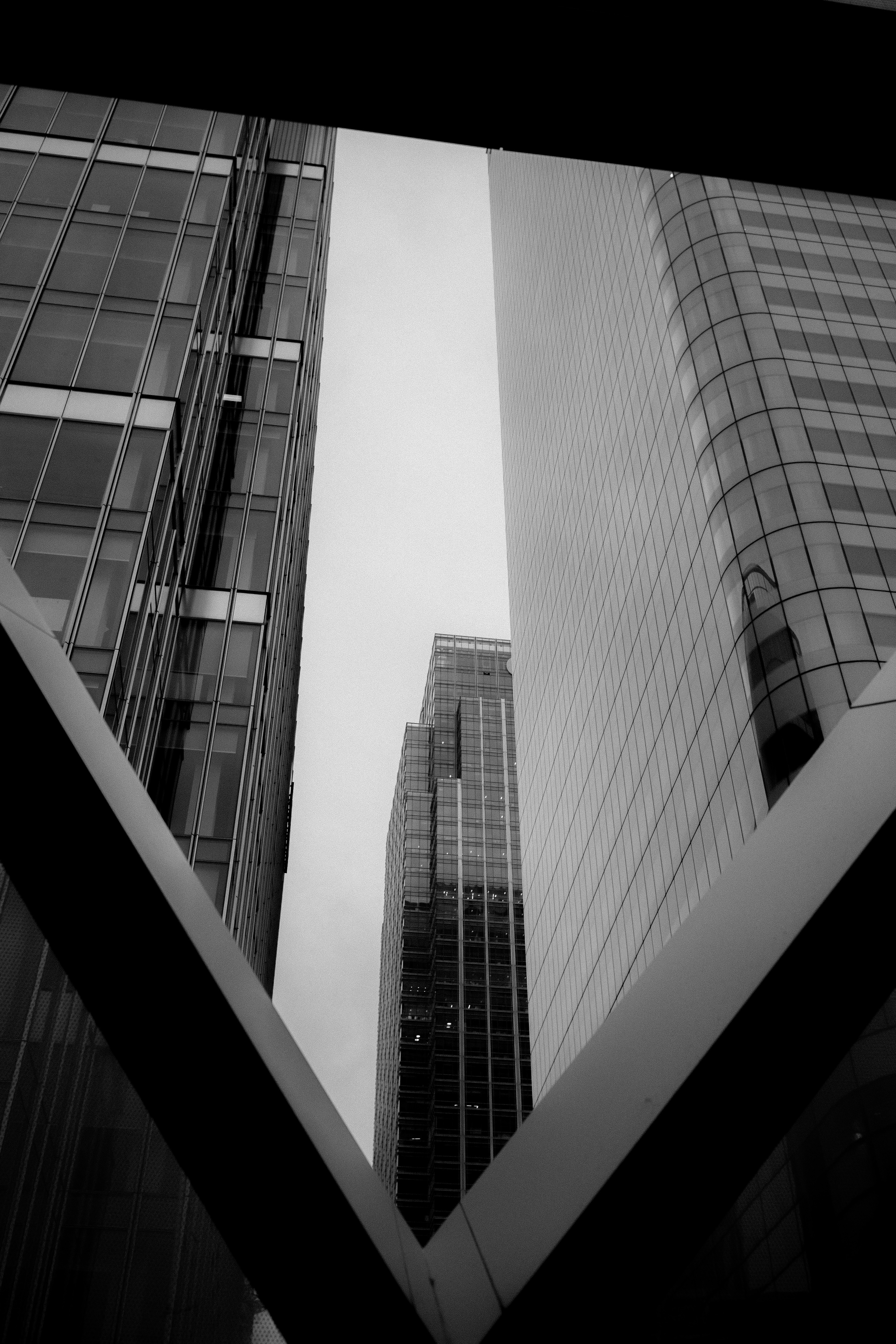 low angle photography of curtain buildings