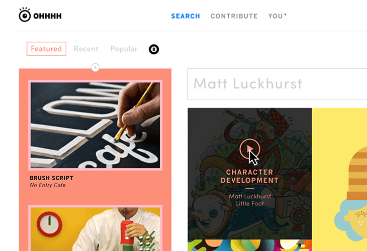A screenshot of a website page displays a featured article titled “BRUSH SCRIPT: No Entry Cake” with a thumbnail image showing a hand applying a brush to white letters on a black background. Below the featured article, a popular article titled “CHARACTER DEVELOPMENT” by Matt Luckhurst is visible. The page includes navigation links for “Featured,” “Recent,” and “Popular,” and a search bar labeled “SEARCH.” A sidebar shows additional content, including a cartoon character design and a yellow background with a cartoon face.
