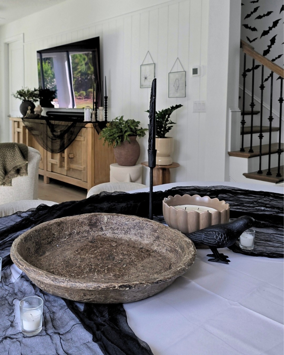 Halloween decor in living room, dining room and hallway