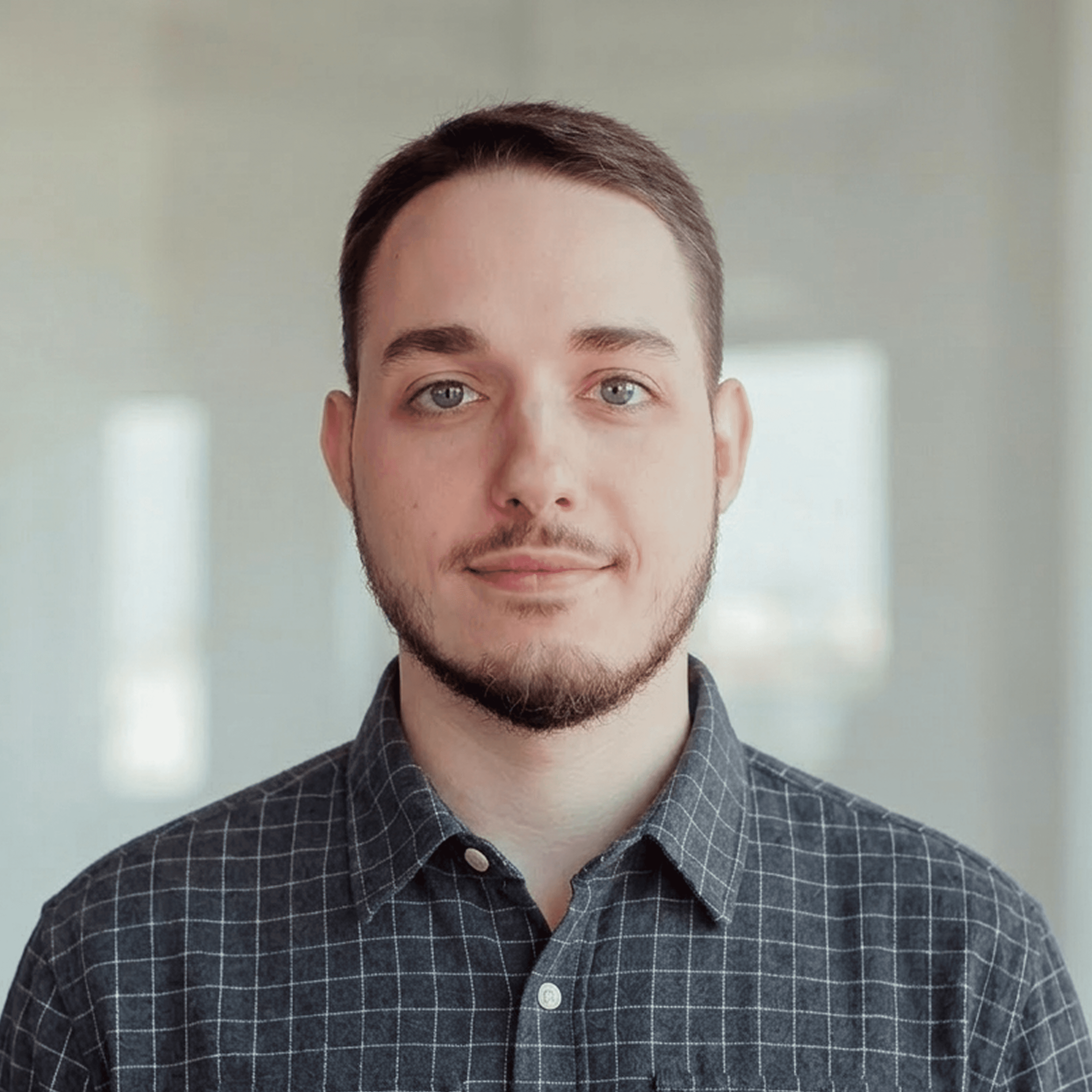 Portrait of a young man on a blue background