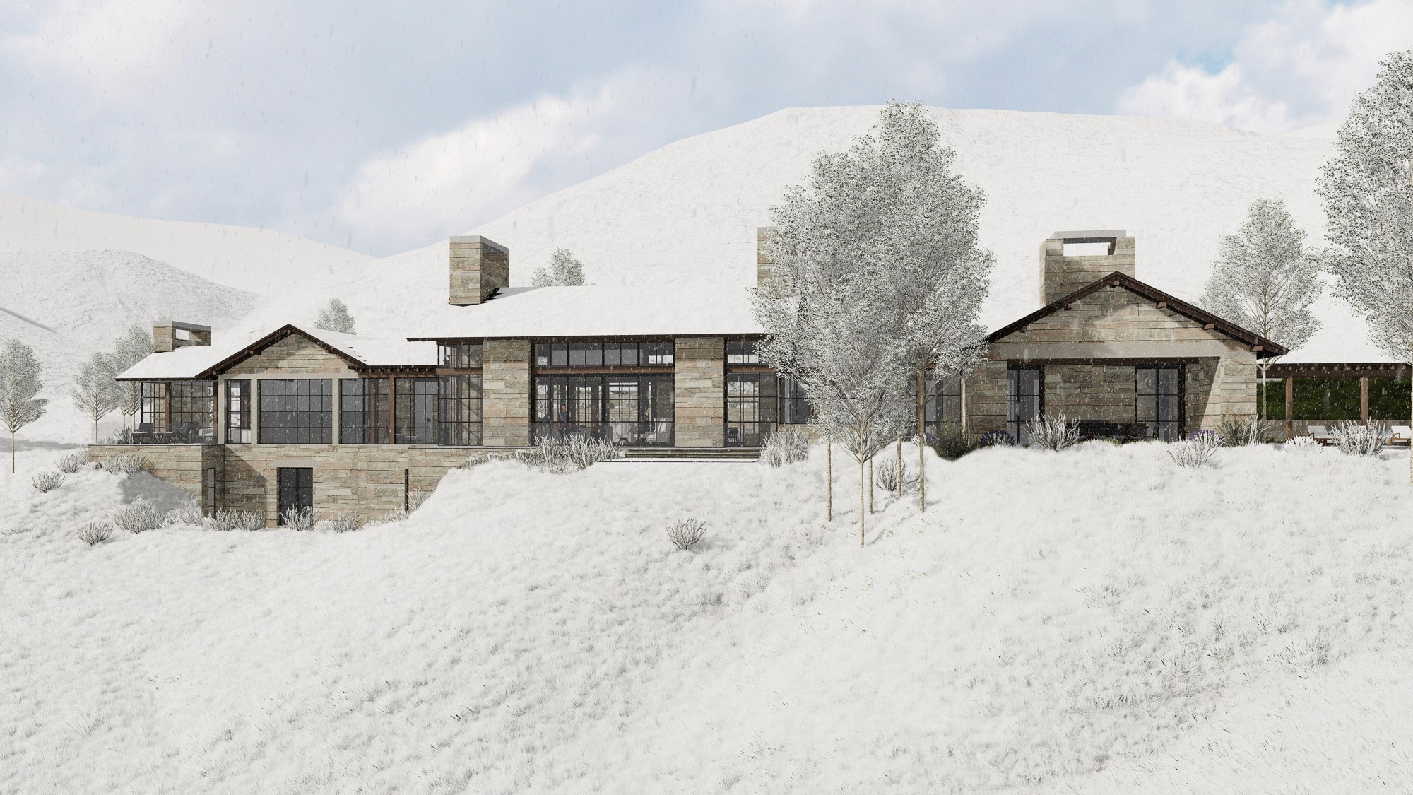 A modern stone ski house in a snowy mountain landscape.