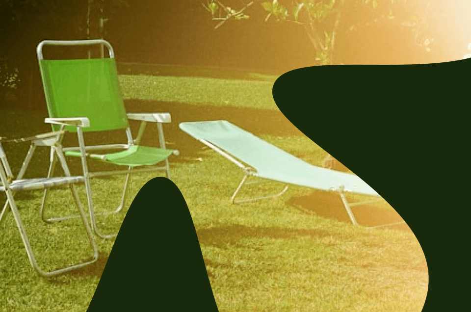 Lounge chairs on a sunny lawn, symbolizing Hey Sid vs Clay Ads in B2B advertising for 2026