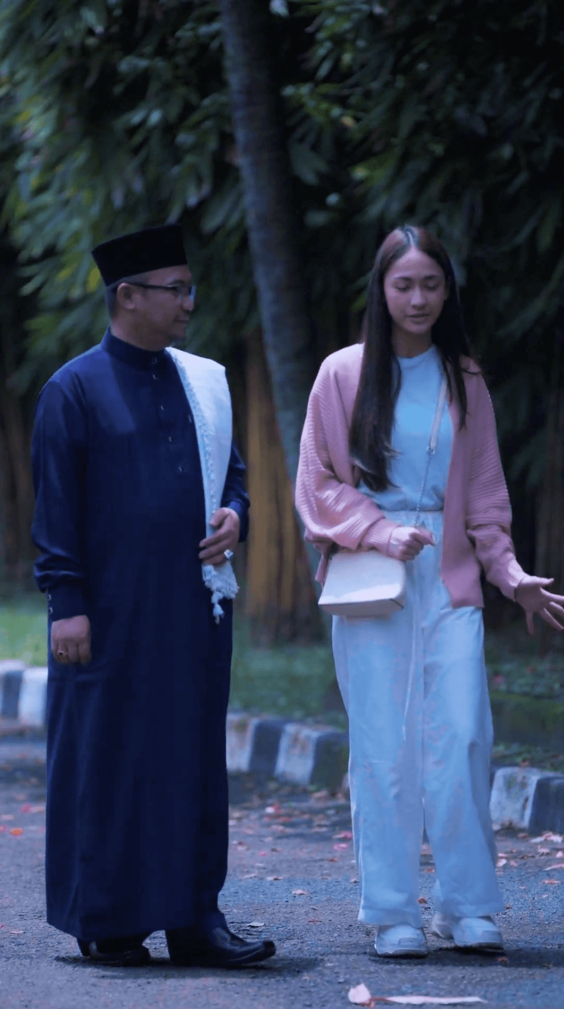 Bold editorial fashion portrait of model in houndstooth blazer with red tie and green shirt against bright turquoise background - Serif Creative Studio luxury fashion photography