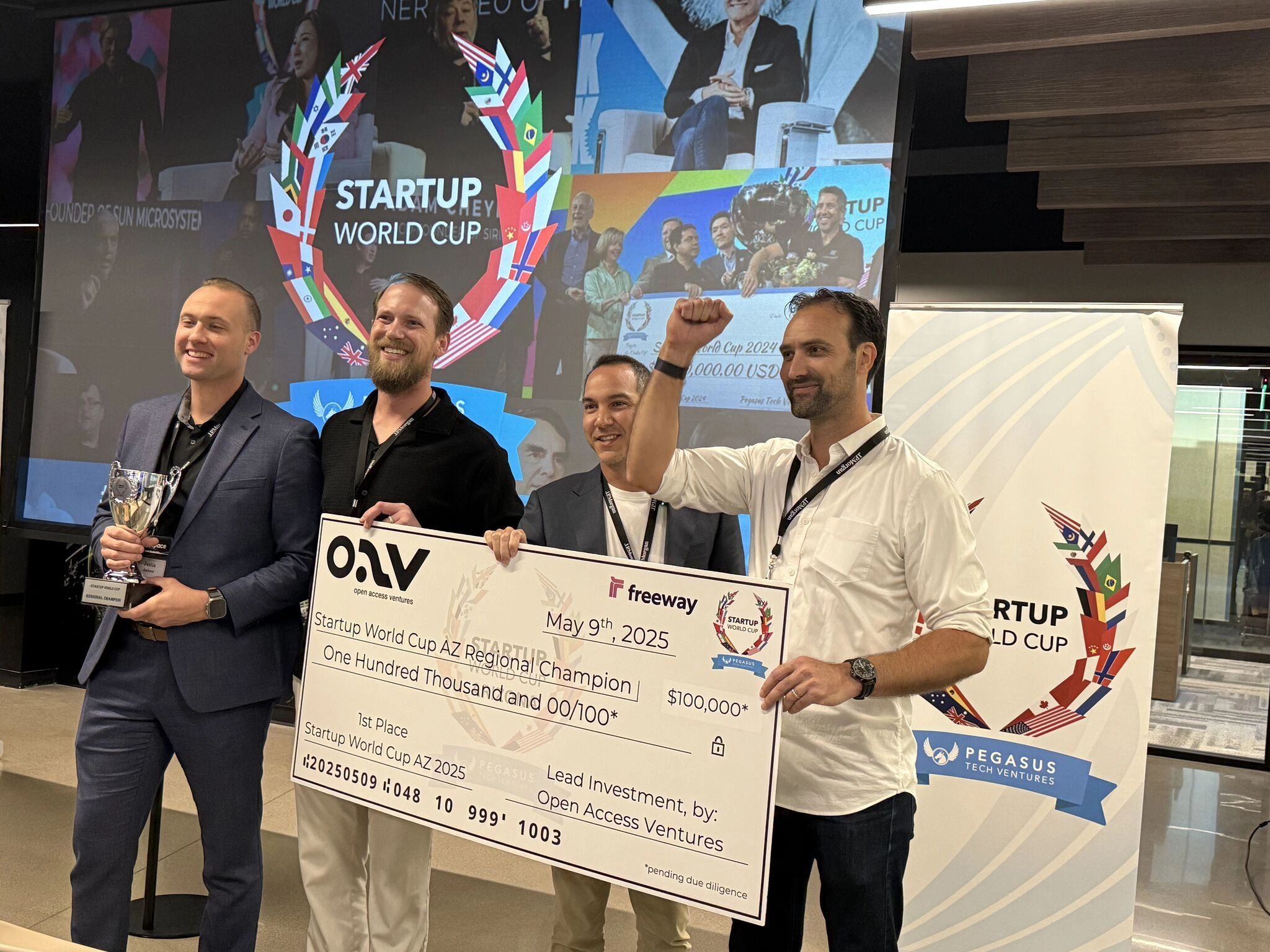 a black and white living room with a large tv
