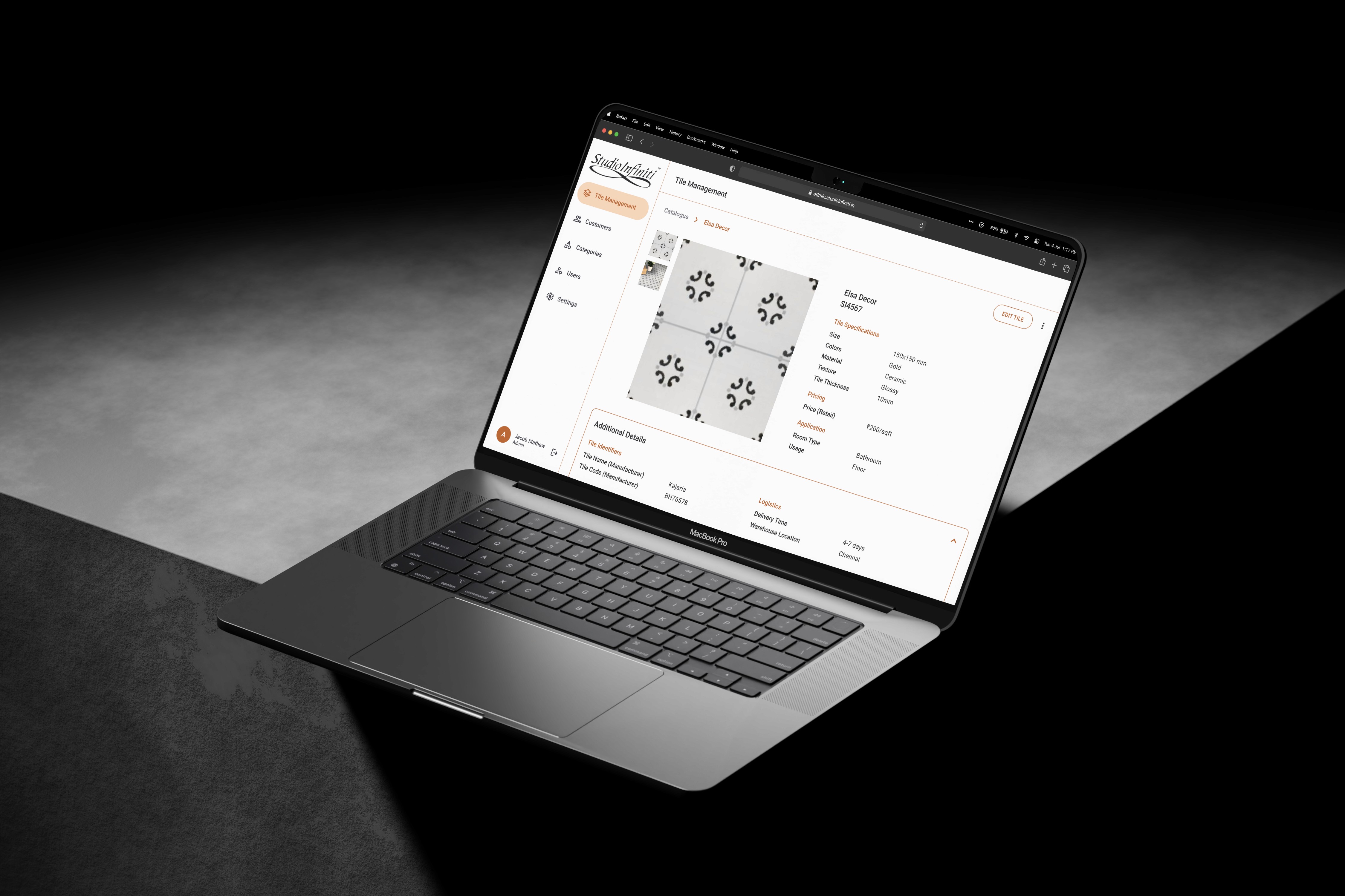 Laptop screen with detailed product view of tile specs and design details for Studio Infiniti.