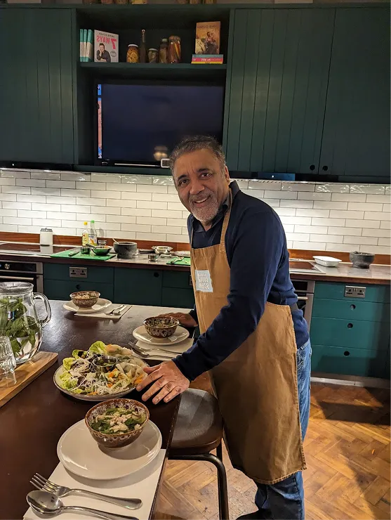 a man standing in a kitchen