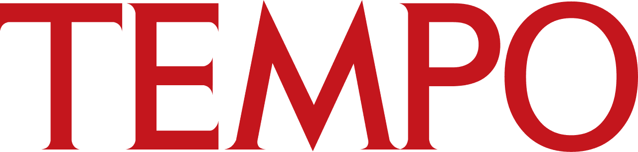 Close-up of lush, dark green leaves, some glossy and wet, against a muted background.