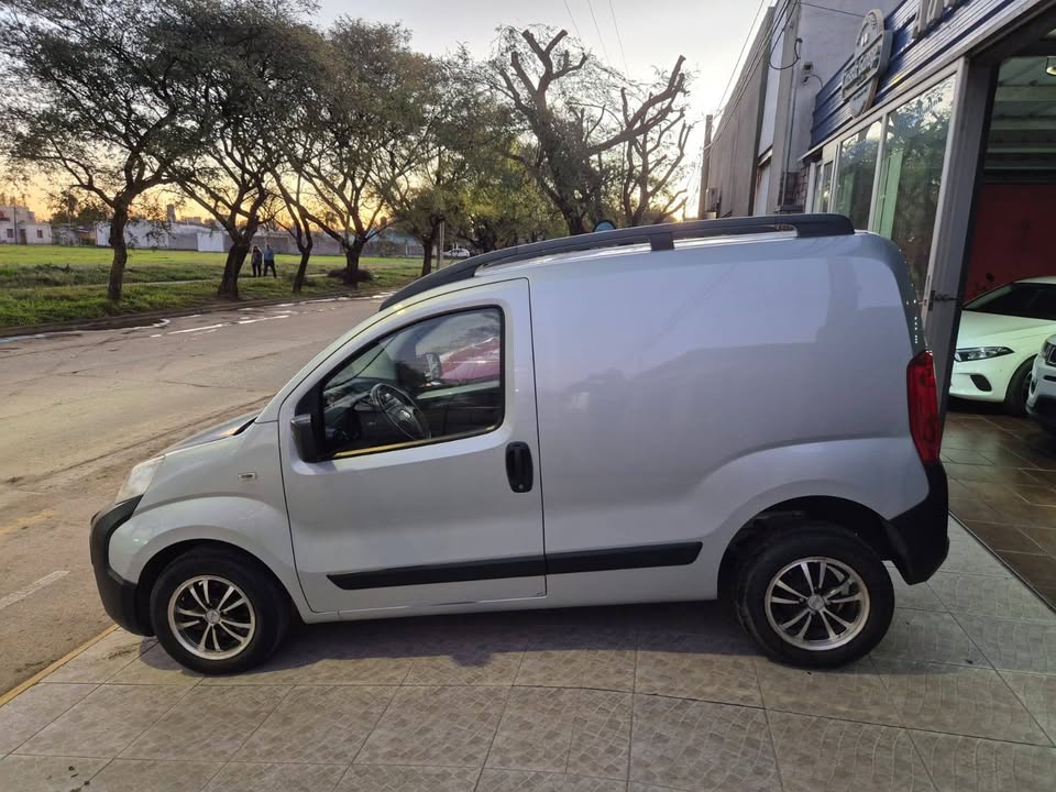 side view of red car