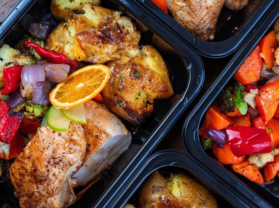 meal prep containers with protein and vegetables to support medications to help lose weight