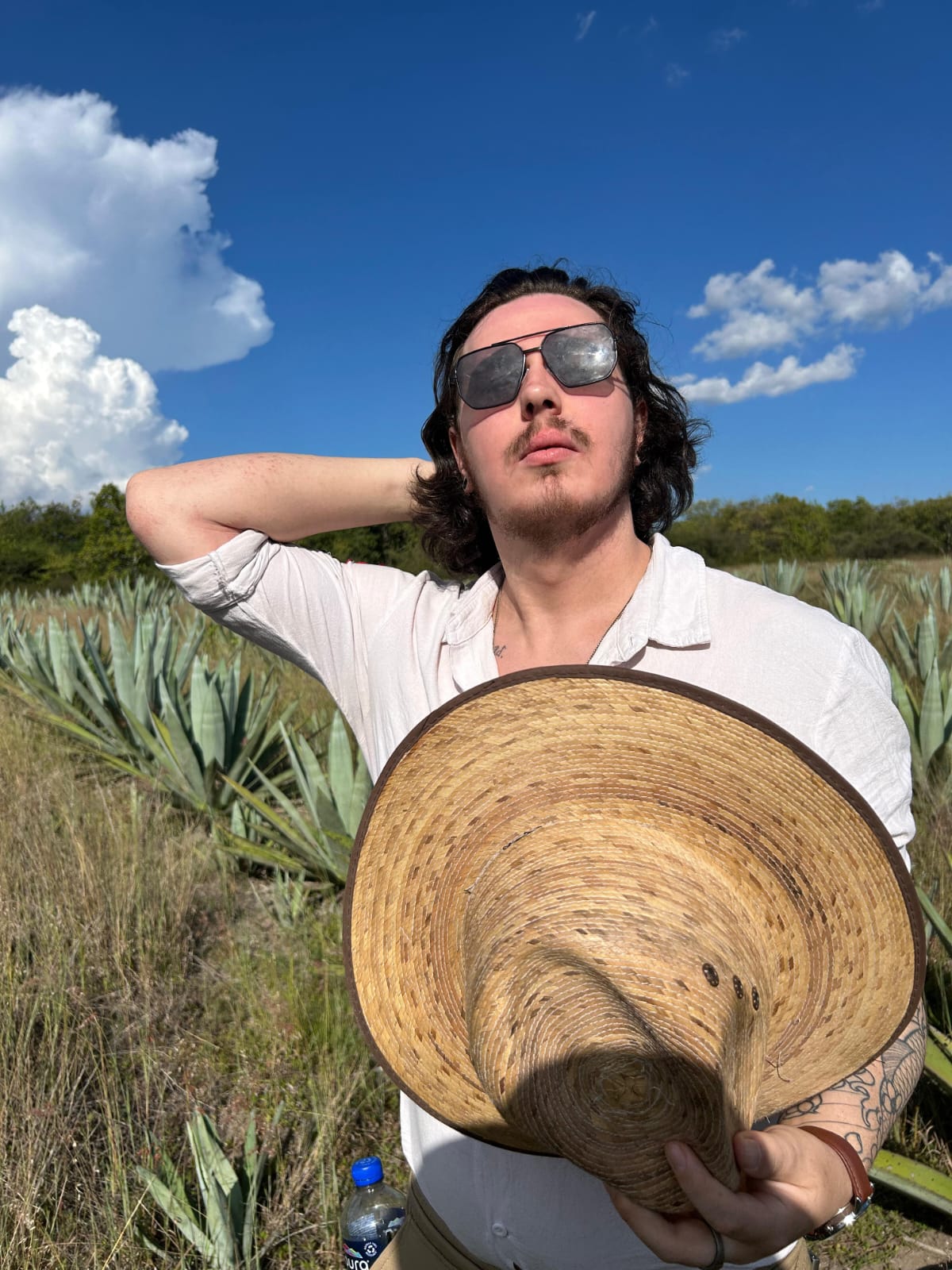 Liam Slater in an agave field