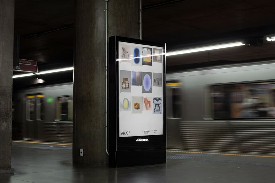 Billboard inside a train station with a capaign design for AR.S.