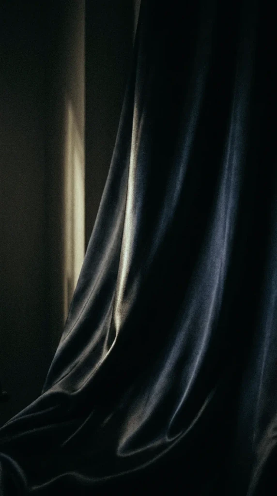 A dark glass corridor