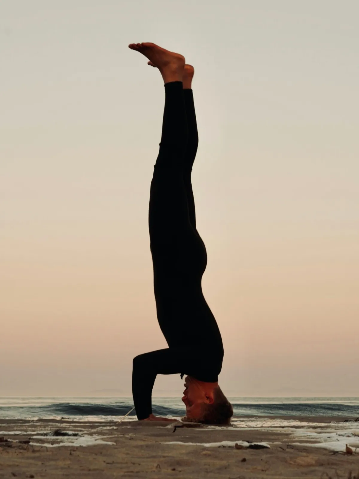 Outdoor aerial yoga flow on bamboo tripod rig by Ulu Yoga Bali instructors