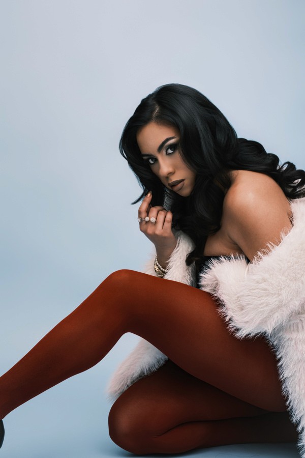 Red tights white first blue backdrop fashion photo