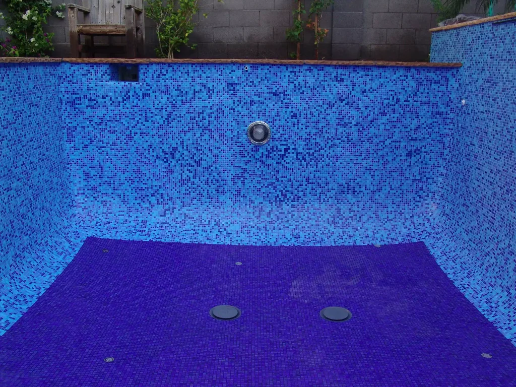 Pool interior in a deep violet-blue glass blend with a lighter waterline — Mosaiclegs Art Studio