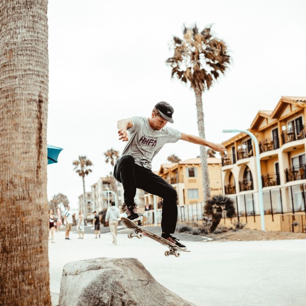 man performing a trick on skateboard