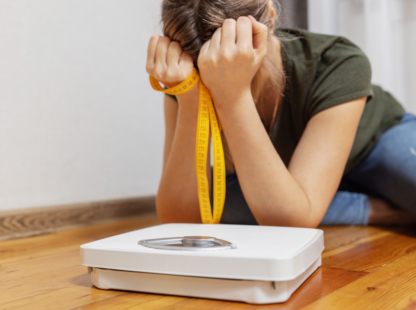 woman feeling disappointed after not achieving the steam room calorie burn that she expected