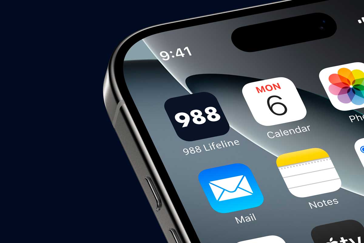 Detail: zoomed in view of a mobile phone with the 988 favicon in the top left corner.