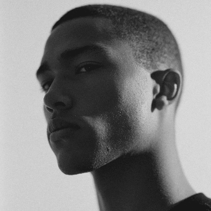 Black and white portrait of Owen Ashcroft, a brand and packaging designer based in New York.