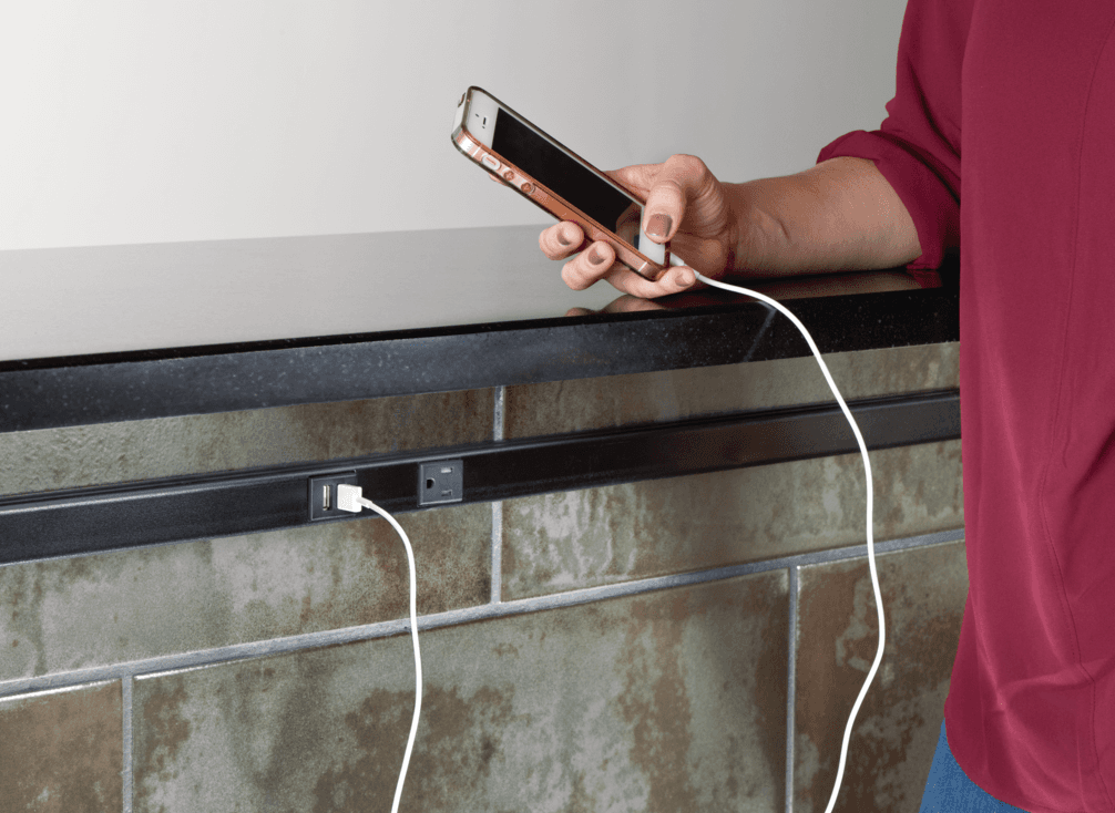 Wiremold multi outlet assemblies for integrated power distribution along raceway runs in office and retail spaces in British 