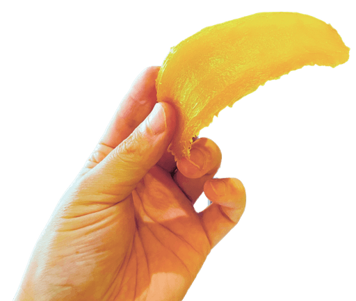 hand holding a piece of hoshi imo