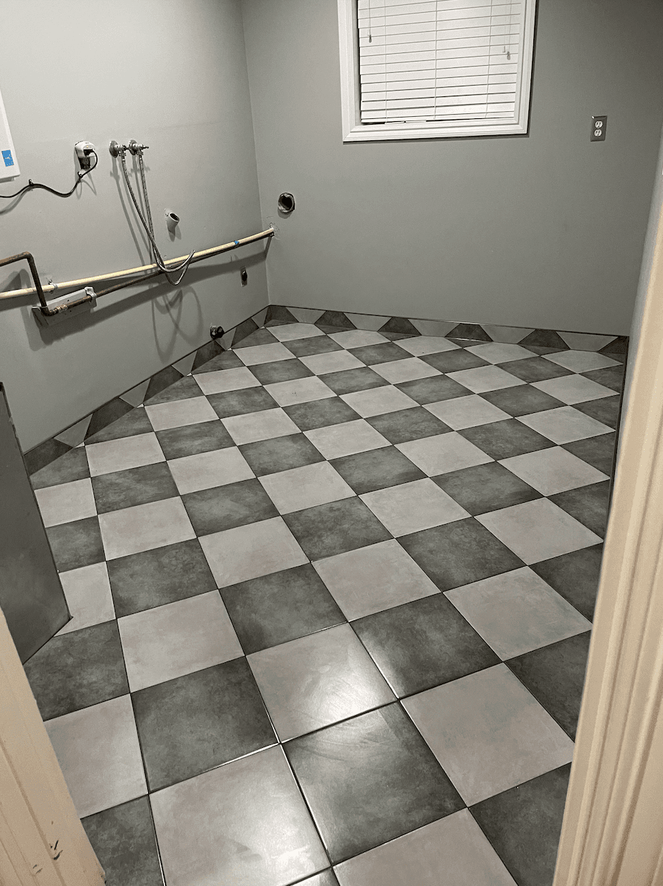 Gray and white checkerboard tile flooring installed by Dream Tiles LLC