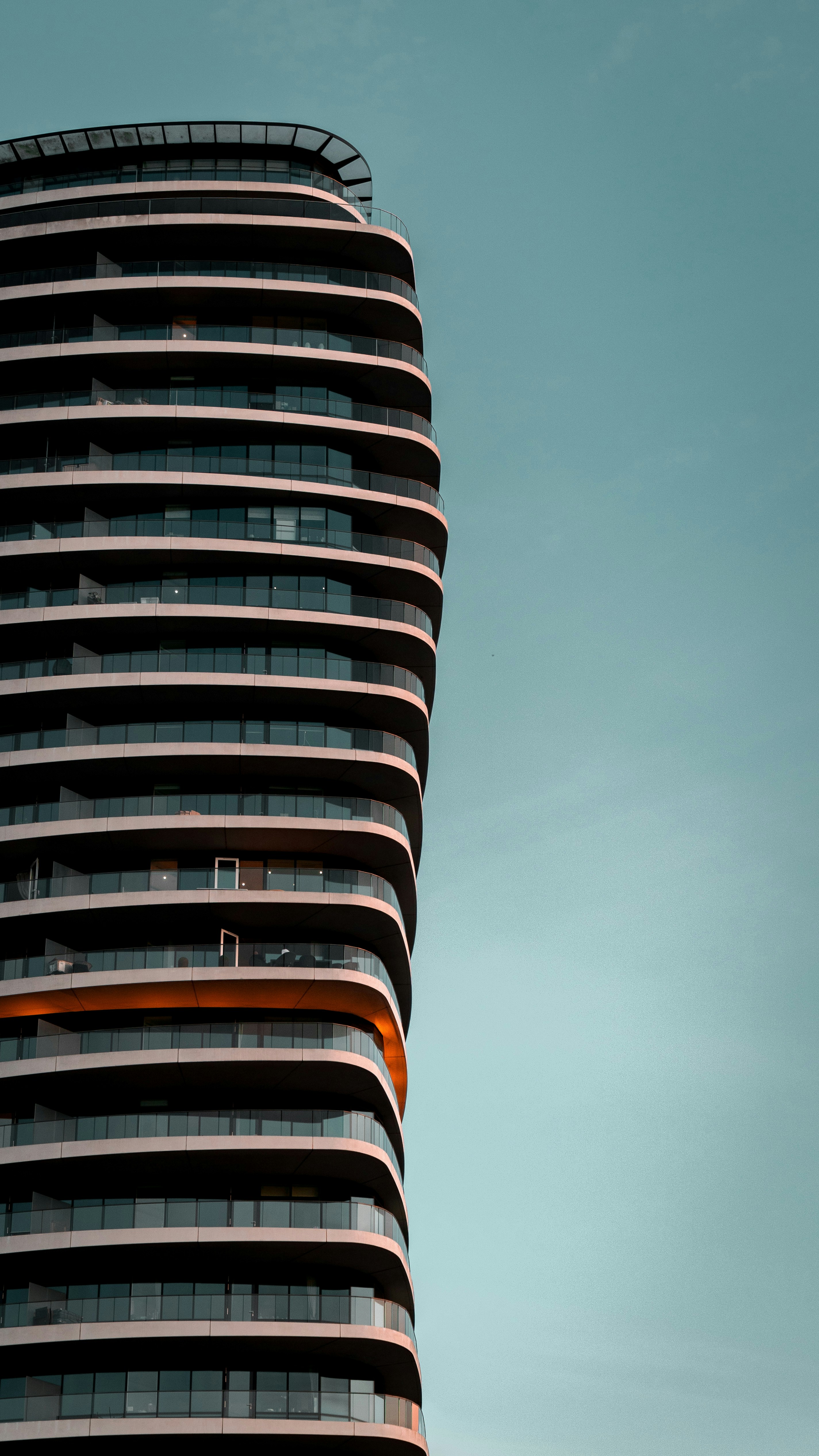 A tall building with a clock on the top of it