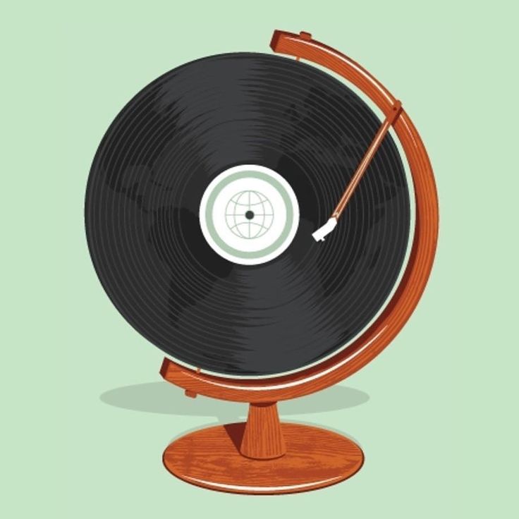 A man playing a drum in front of a group of people