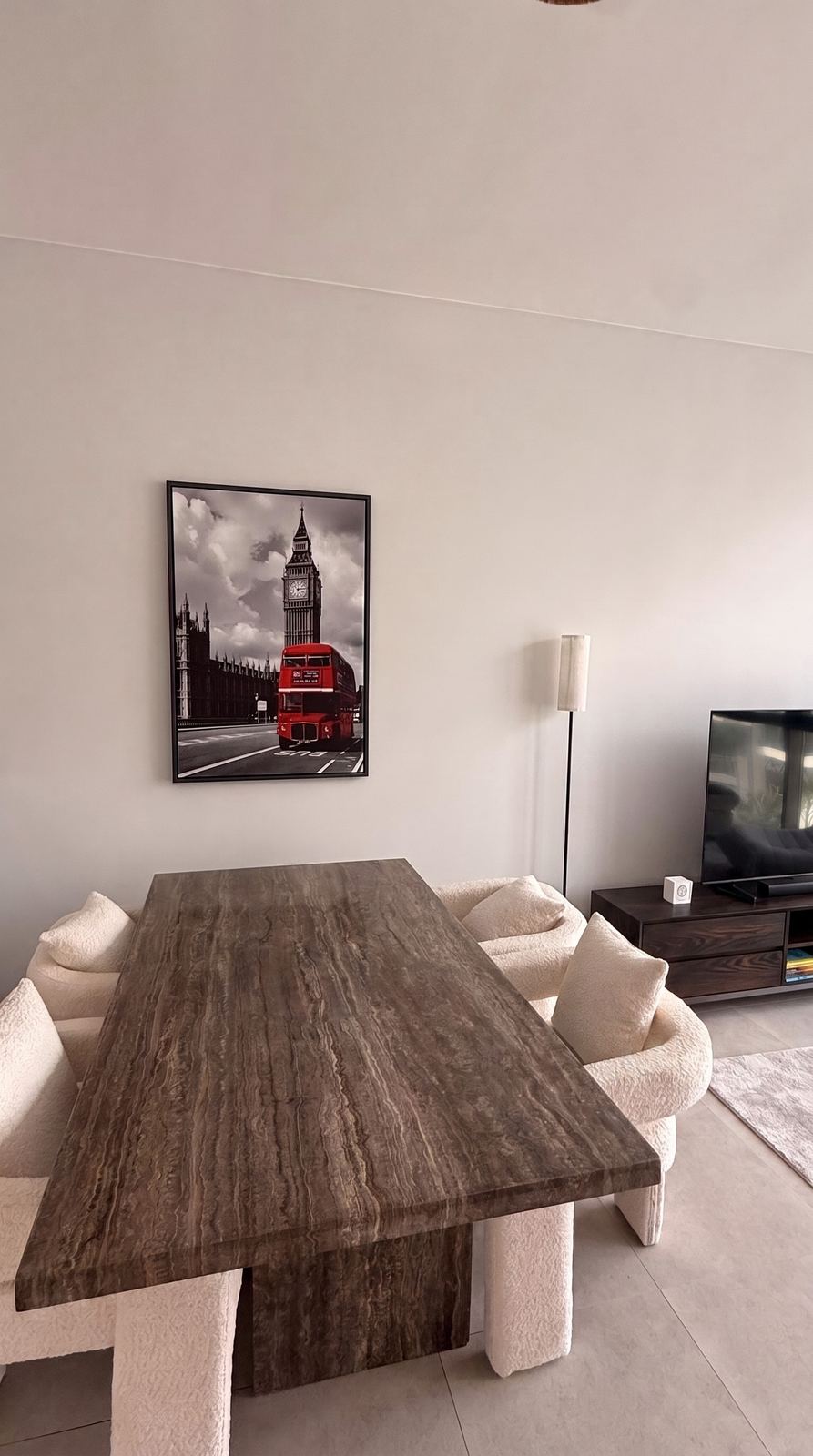 Dining table and lounge in a furnished apartment
