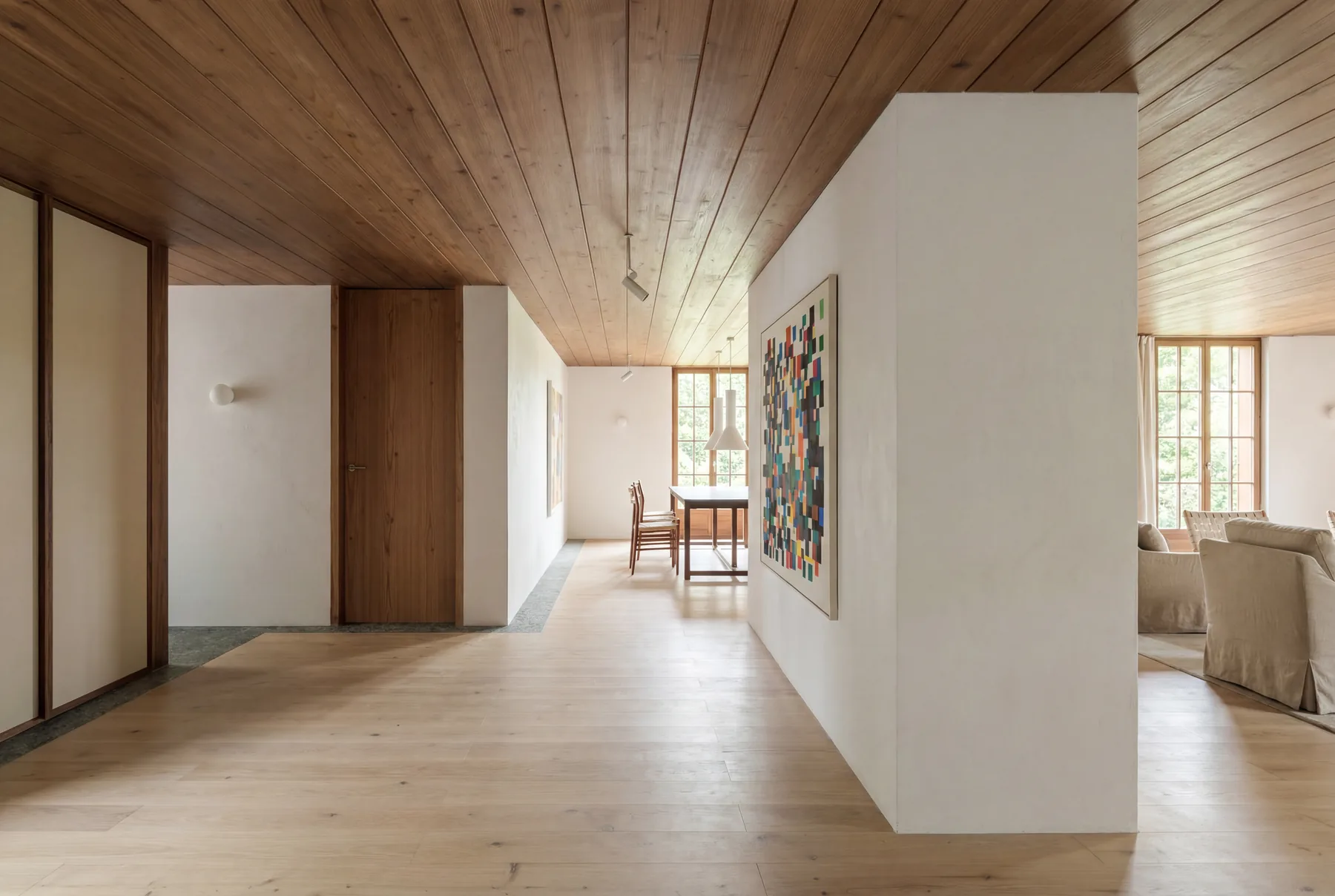 Bedroom with floor-to-ceiling windows and mountain panorama — Gstaad residence