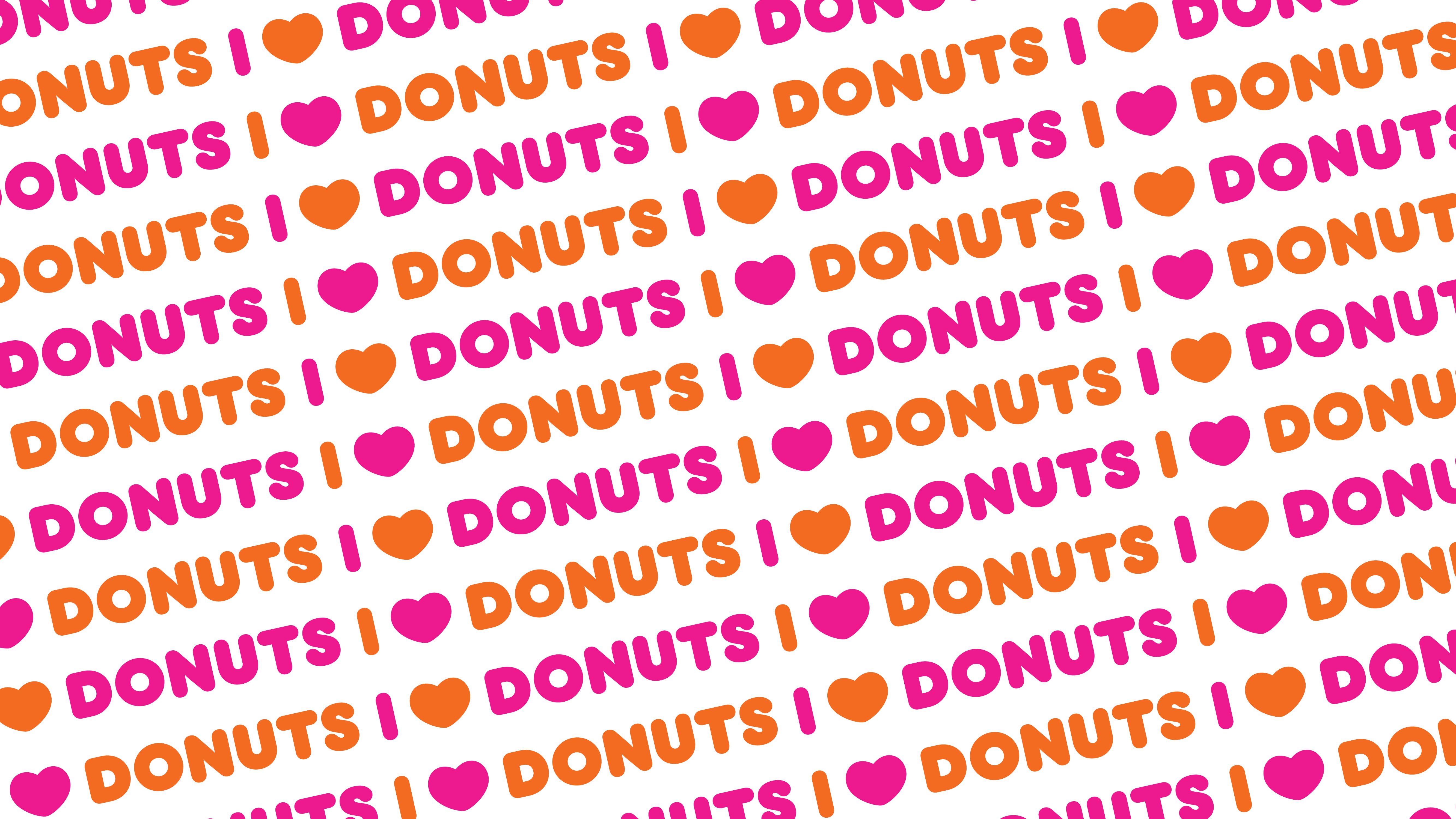 Playful Dunkin’ design featuring ‘I ❤️ DONUTS’ in alternating pink and orange letters, creating a fun and colorful pattern.