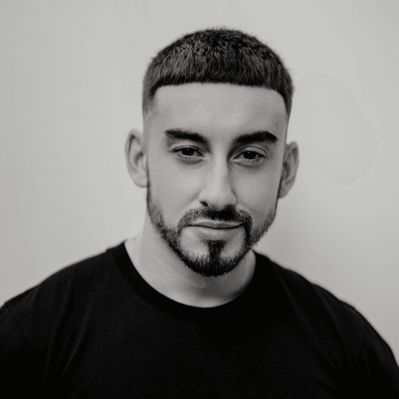 Team member presenting in front of task board, representing collaborative planning.