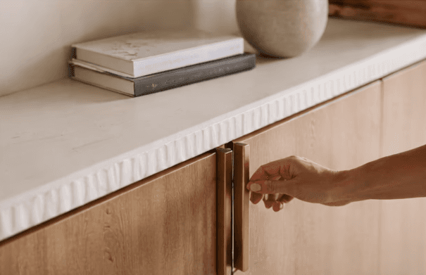 Woman by the sea with waves splashing