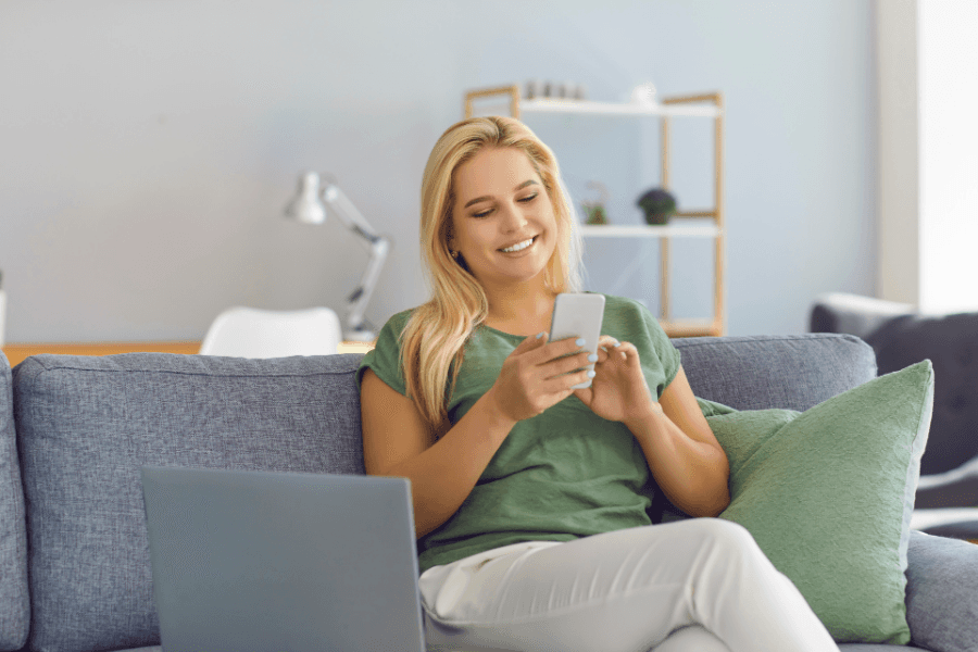 Resident enjoying fast uncapped fibre internet included in Cape Town rental apartments.