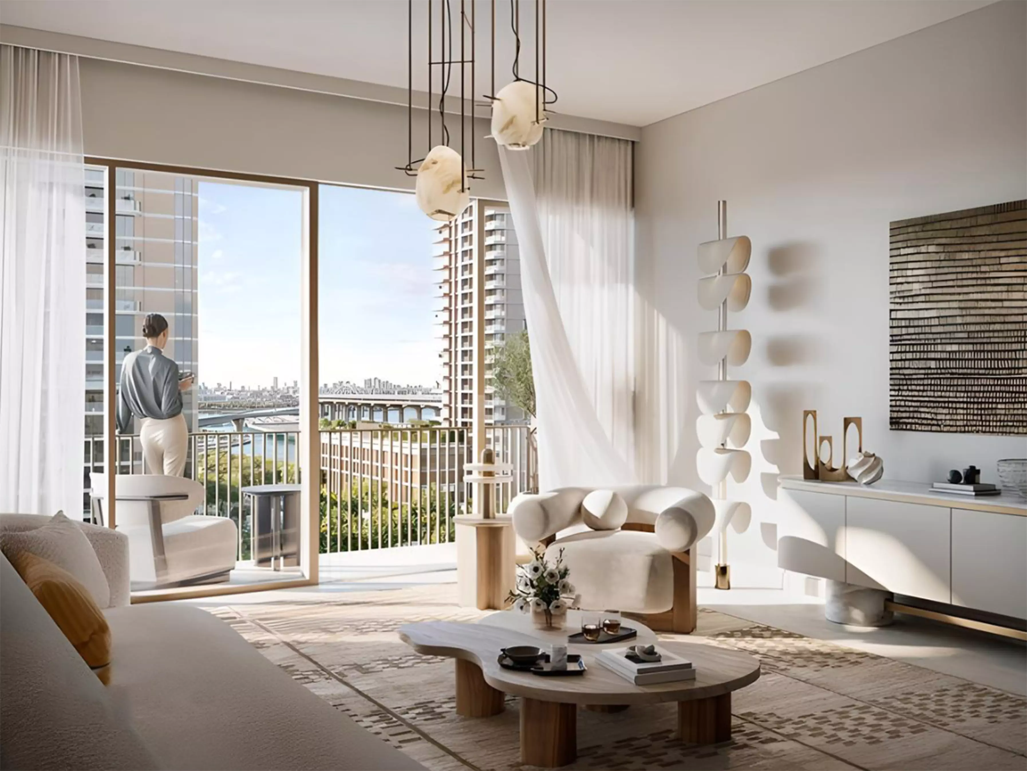 Modern living room interior with balcony views of Emaar Altus and Dubai skyline in the background.