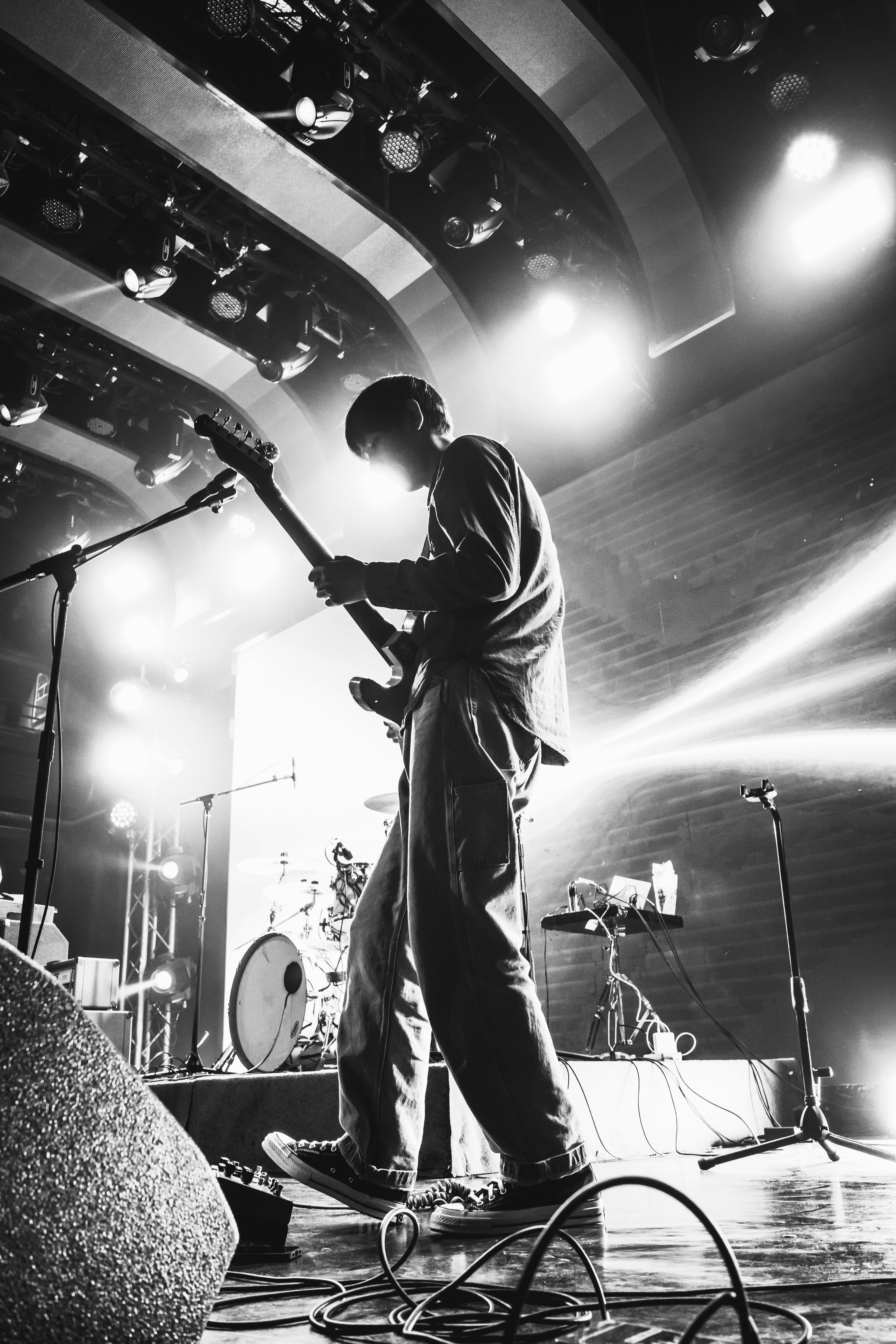 guy playing guitar on stage