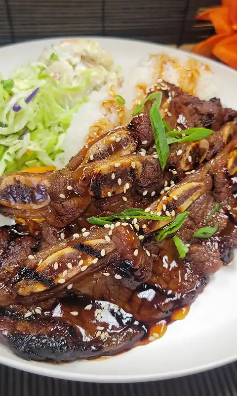 Tender Grilled Short Ribs marinated in traditional Hawaiian BBQ sauce