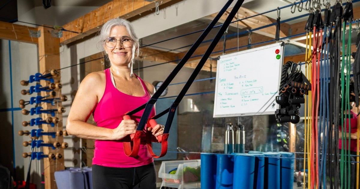 Woman in 50s doing resistance training